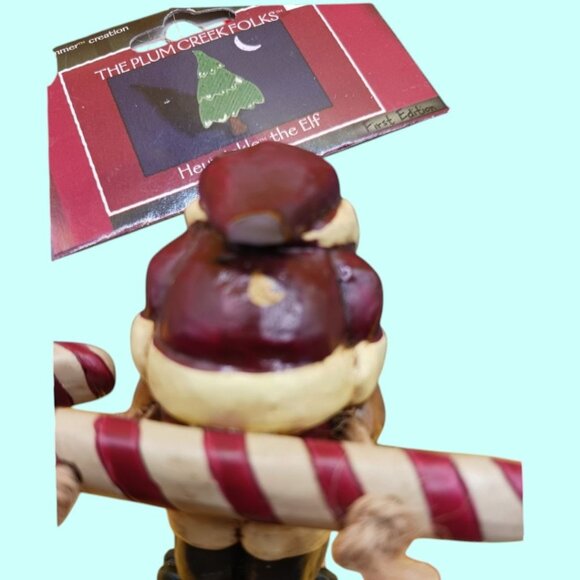 The Plum Creek Folks Handcrafted "Hanging The Elf" Ornament - Picture 4 of 13